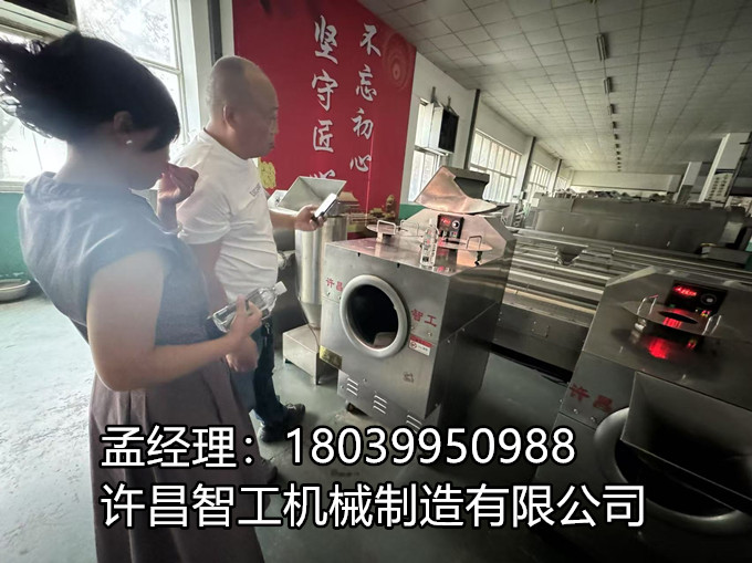 6 月 29 日，周口客戶來到我廠考察電磁炒貨機